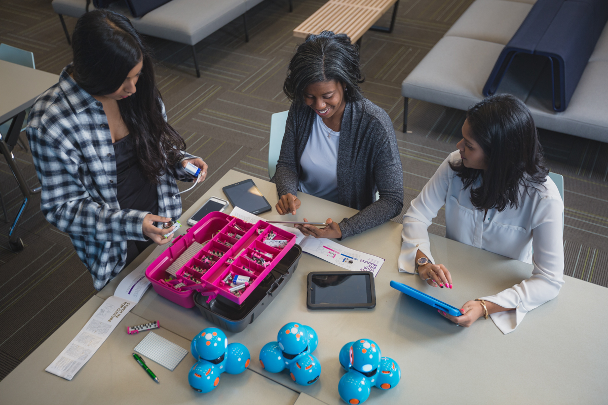 academics image showing laboratory, north campus, robotics, sitting, smiling, students, tables at other