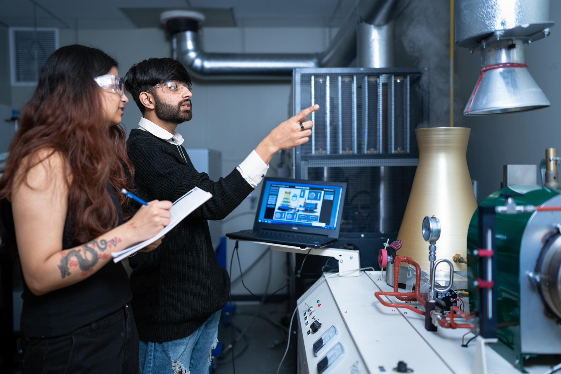 Engineering students in a lab. 