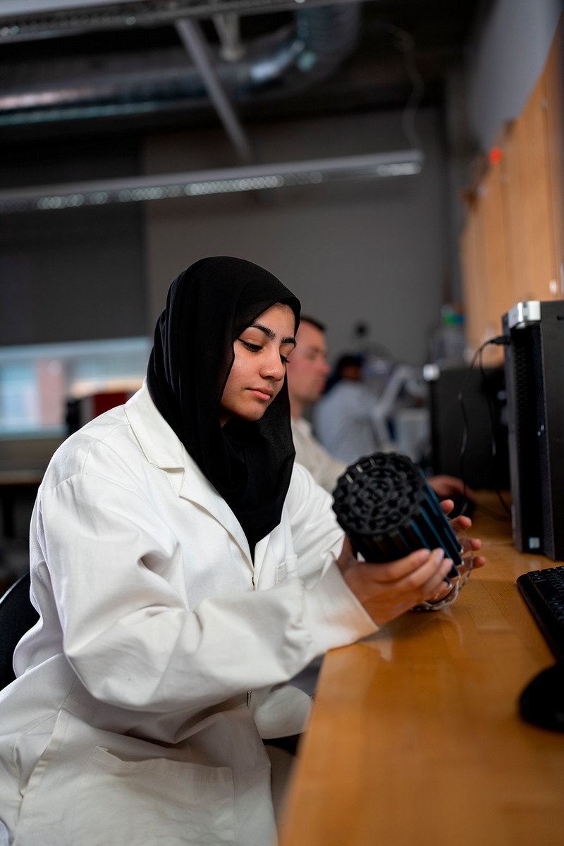 Female student in nuclear undergraduate lab