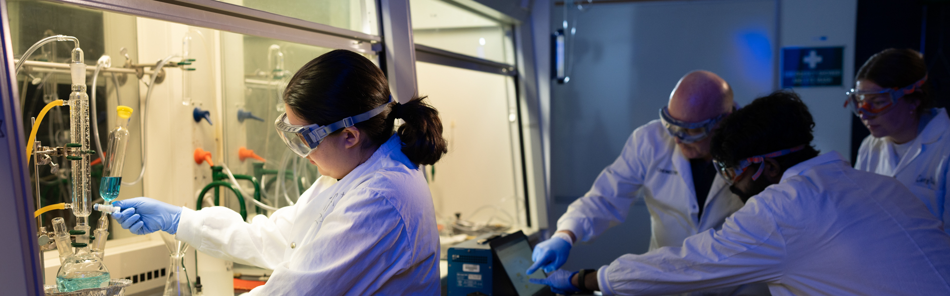 Students working with chemicals in a lab