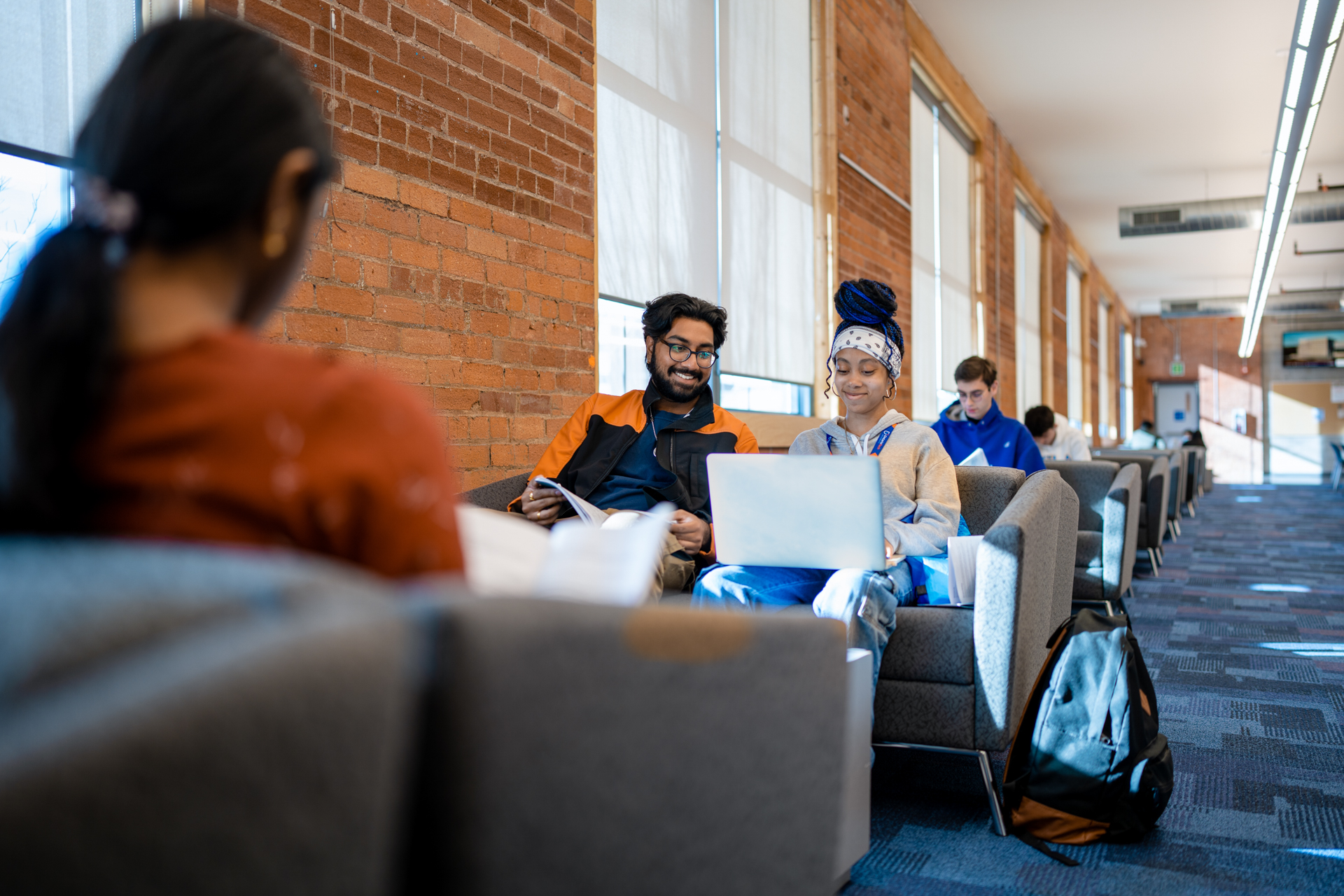 students studying on campus