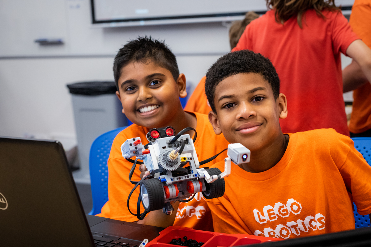 events image showing ontario tech, children, summer camp, robotics at shawenjigewining hall