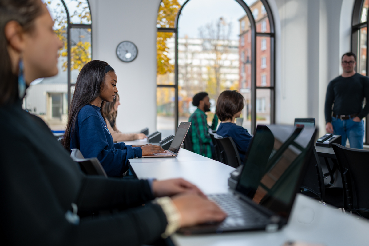 students studying on campus