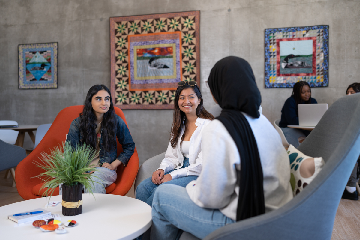 Students sitting in student space