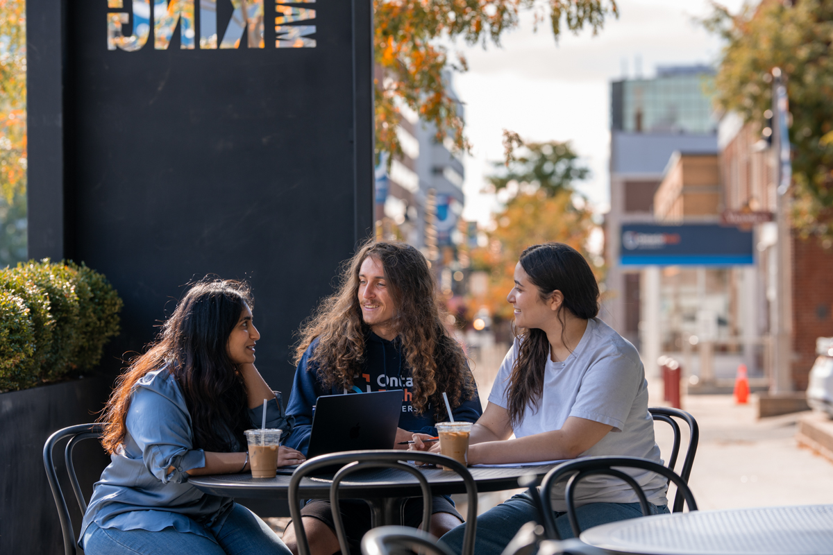 students studying on campus