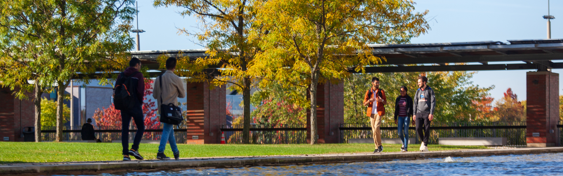Students walking together on campus. 