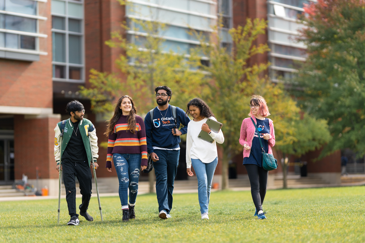 life on campus image showing brick, common area, glass, grass, north campus, outdoors, polonsky, smiling, students at polonsky commons